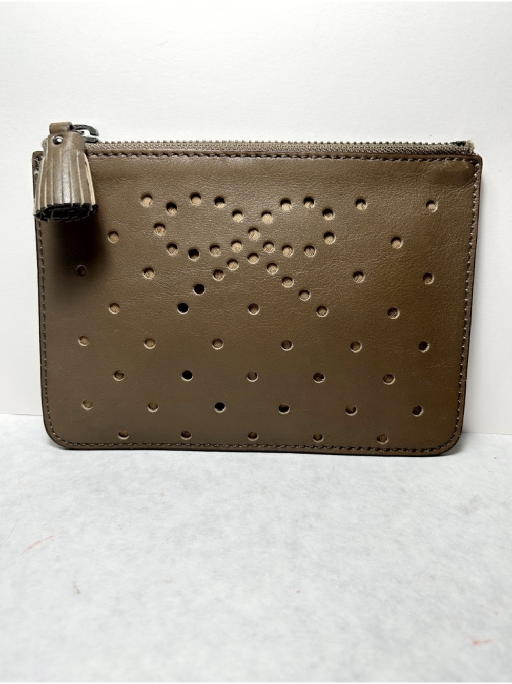 Anya Hindmarch Khaki Leather Pouch, Signature Perforated Bow Design and a Tassel